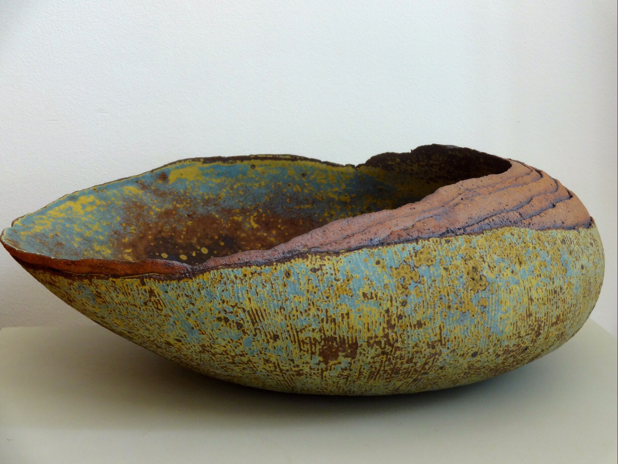 Image of a bowl in greens and browns