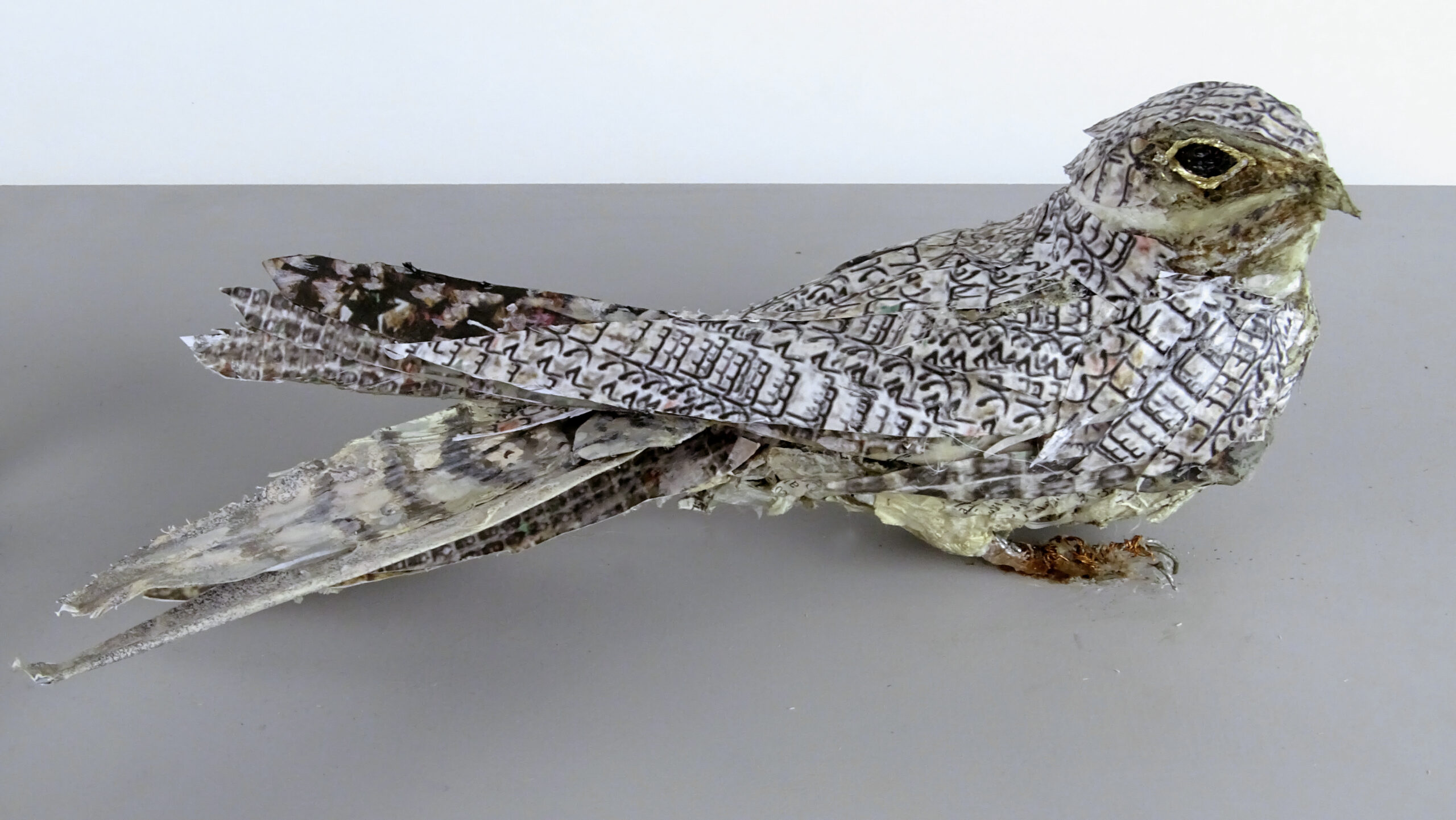 Mixed media sculpture of a nightjar bird