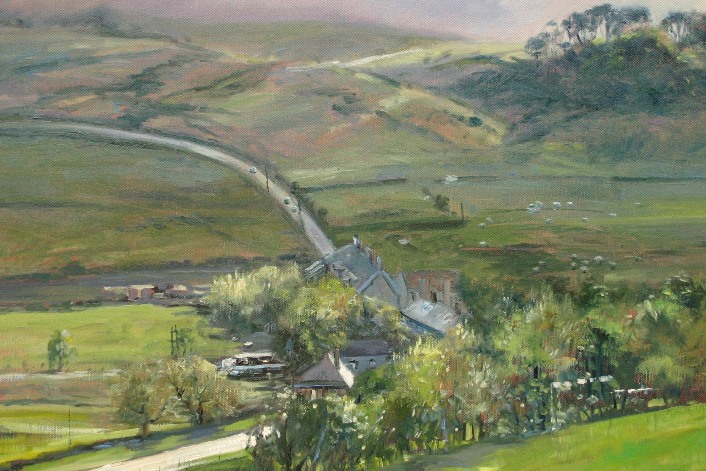 Painting of a landscape with fields and hills