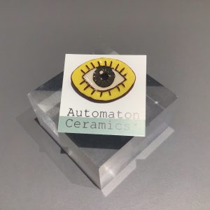 Yellow & Green Eye Brooch