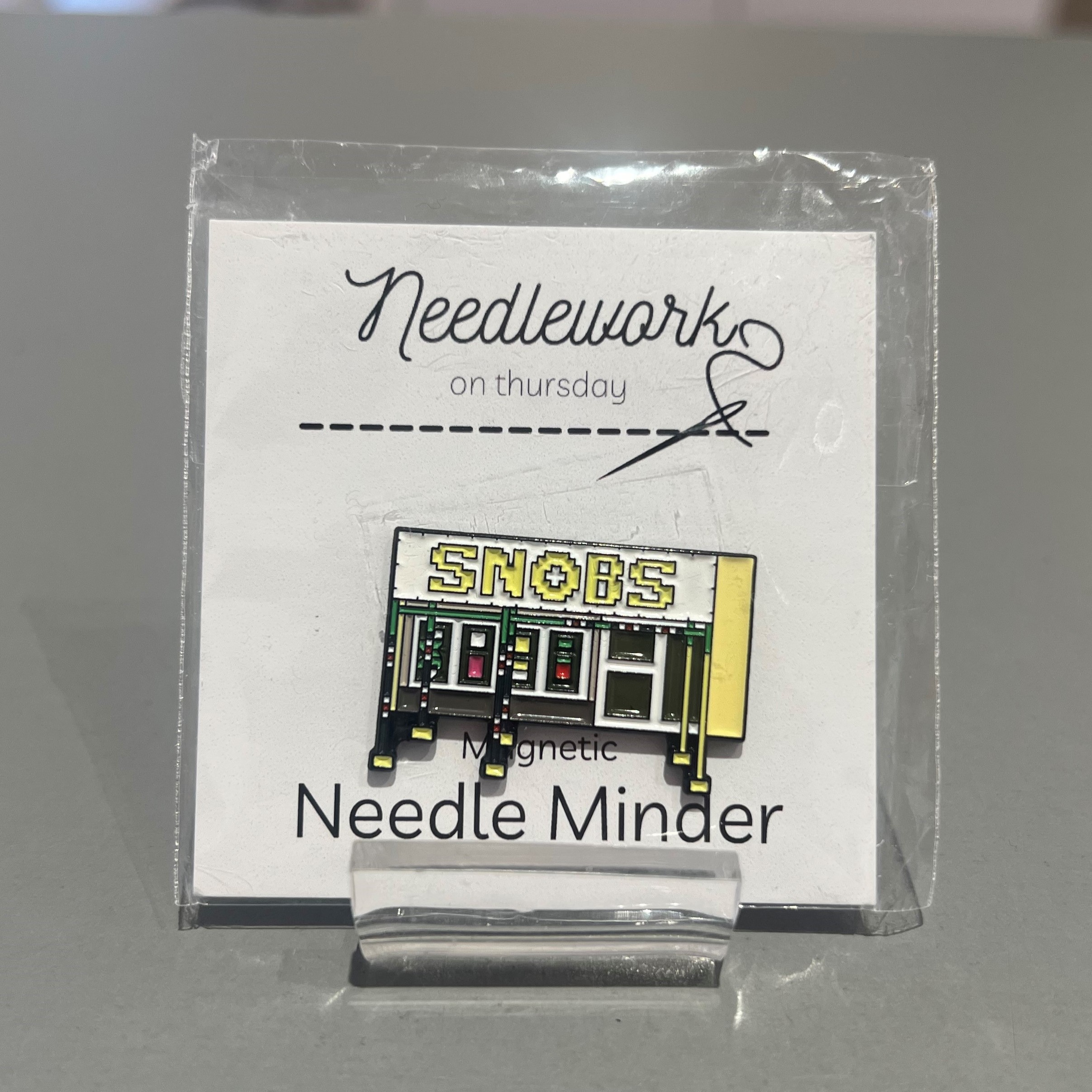 Snobs Needle Minder